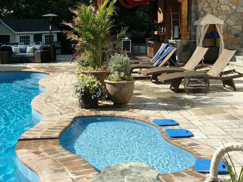 Soak up the sunshine in comfort and style with custom-made tanning ledges by Latham Pool Products. 